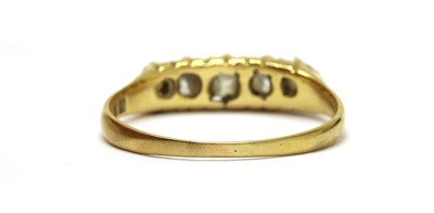 Lot 21 - An 18ct gold five stone diamond ring