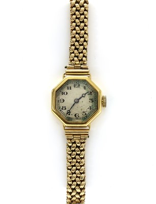 Lot 473 - A ladies’ gold mechanical bracelet watch