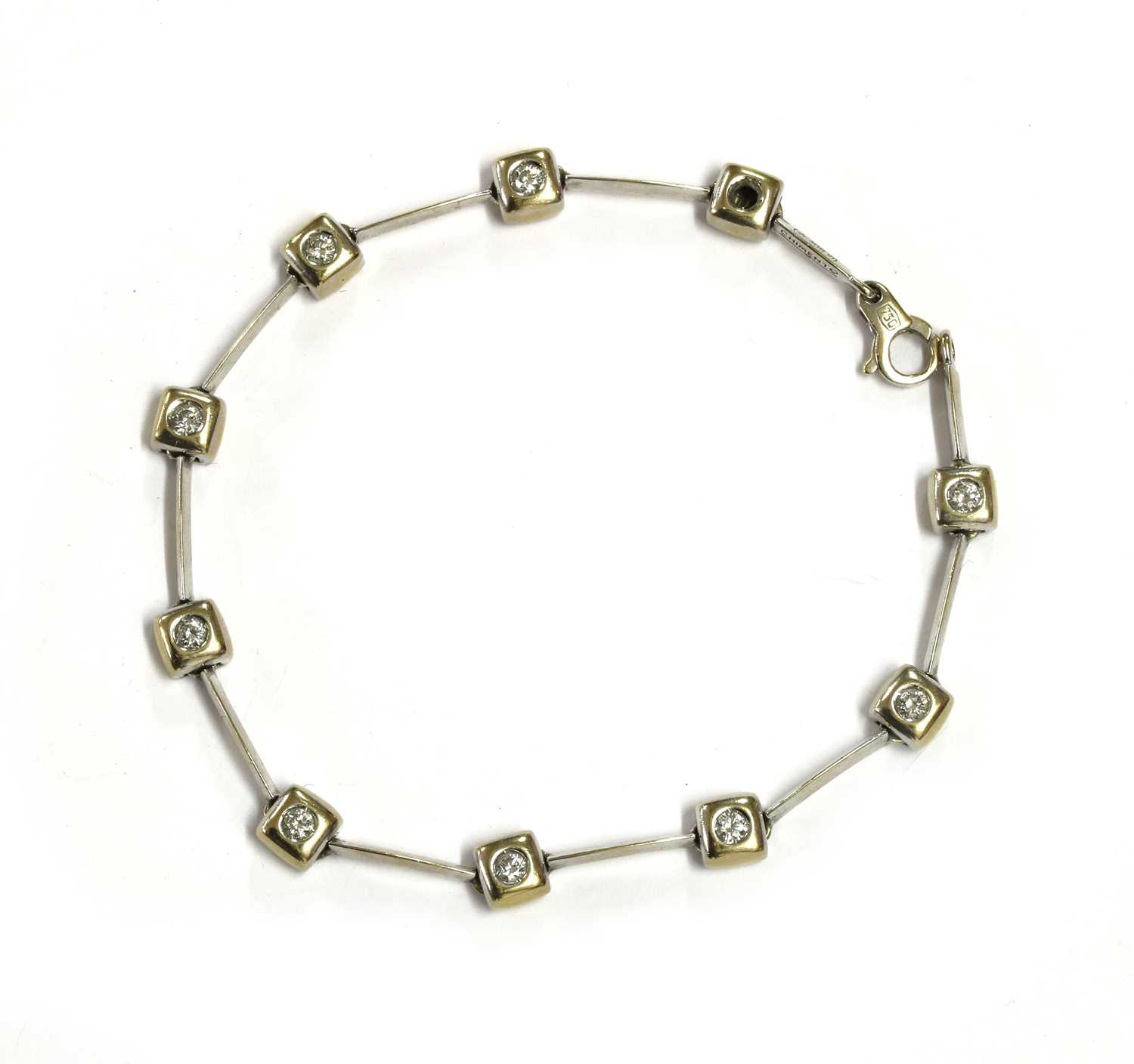 Lot 163 - A white gold diamond bracelet, by Chimento