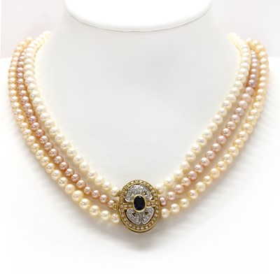 Lot 323 - A three row uniform cultured freshwater pearl necklace