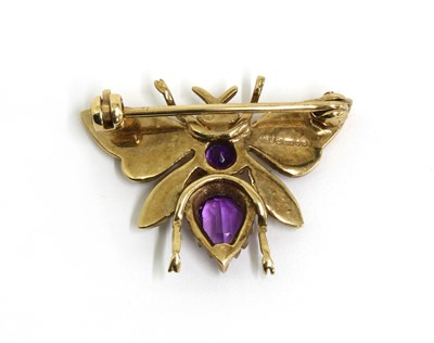 Lot 318 - A 9ct gold amethyst, ruby and seed pearl set butterfly brooch