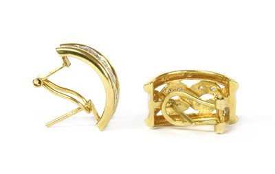 Lot 1100 - A pair of gold diamond set half hoop earrings