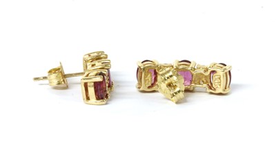 Lot 1140 - A pair of gold ruby and diamond earrings