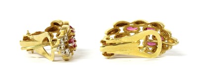 Lot 1152 - A pair of gold ruby and diamond earrings