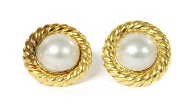 Lot 1258 - A pair of 18ct gold mabé pearl earrings