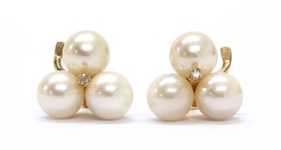 Lot 330 - A pair of gold trefoil cultured pearl and diamond earrings