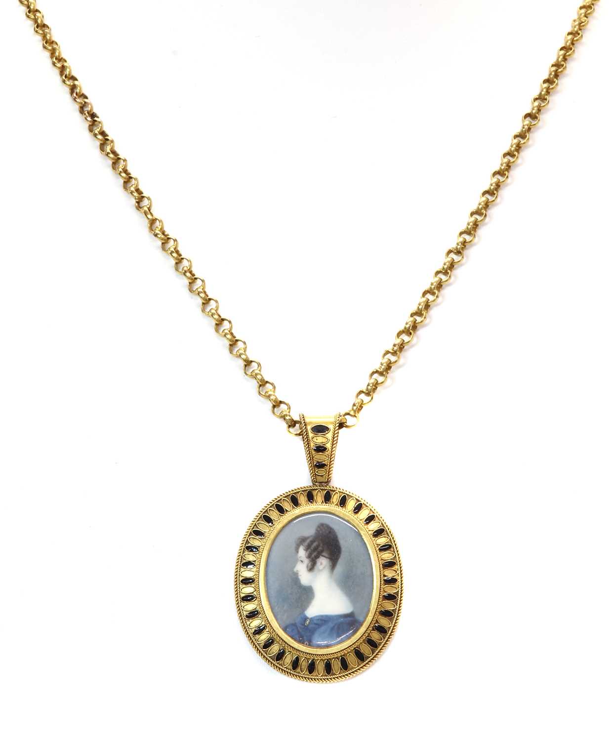 Lot 58 - An Etruscan style gold and enamel glazed picture locket, c.1860
