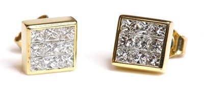 Lot 402 - A pair of nine stone princess cut diamond square cluster earrings