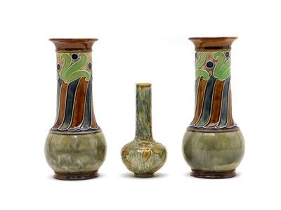 Lot 95 - A pair of Doulton stoneware vases decorated by Ethel Beard