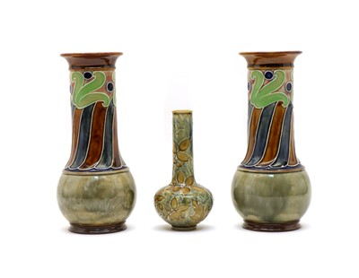 Lot 95 - A pair of Doulton stoneware vases decorated by Ethel Beard