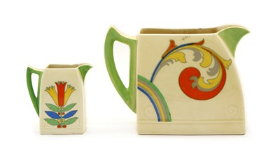 Lot 91 - A graduated pair of Royal Doulton Syren pattern Art Deco jugs of angular form