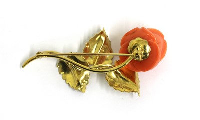 Lot 61 - An Italian gold carved coral brooch