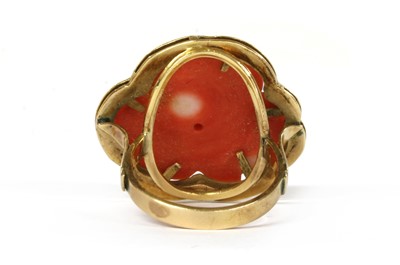 Lot 1073 - A gold carved coral ring and bracelet suite