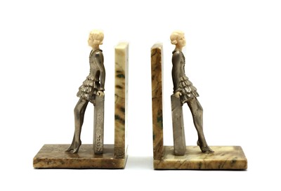 Lot 132 - A pair of bookends in the style of Josef Lorenzl