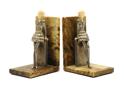 Lot 132 - A pair of bookends in the style of Josef Lorenzl