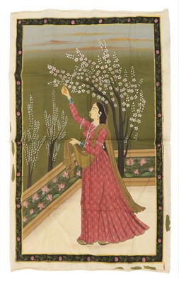 Lot 102 - An Indian painting on silk depicting a woman in flowering mauve gown