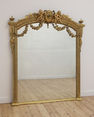 Lot 203 - A large giltwood overmantel mirror