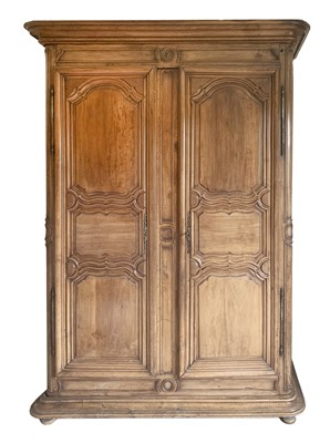 Lot 472 - An 18th century French walnut armoire