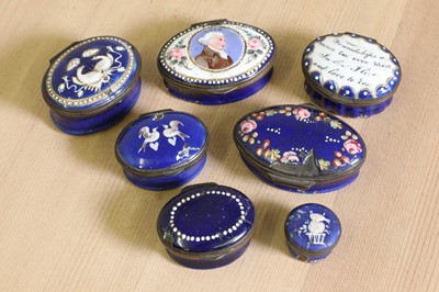 Lot 727 - A group of seven George III deep blue enamel boxes