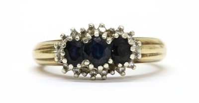 Lot 295 - A 9ct gold sapphire and diamond triple cluster ring