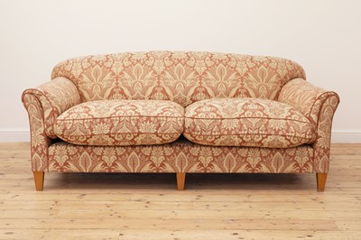 Lot 616 - A three-seater sofa