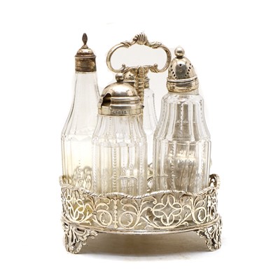 Lot 20 - A George III and later silver cruet set