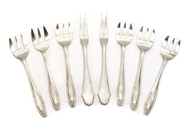 Lot 23 - A set of six silver seafood/salad forks