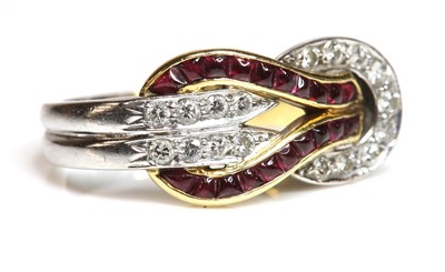 Lot 478 - An 18ct two colour gold ruby and diamond Knot of Heracles ring