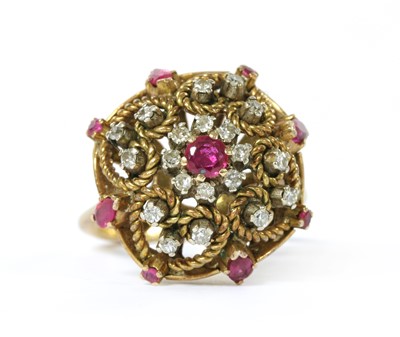 Lot 1380 - A gold synthetic ruby and diamond cluster ring