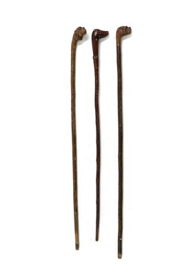 Lot 152 - A carved wooden walking stick
