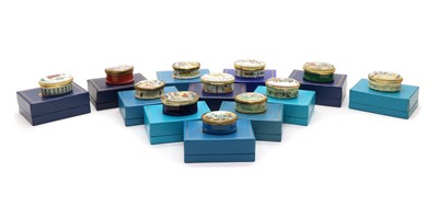 Lot 225 - A complete set of enamelled Halcyon Days Limited Edition Christmas trinket boxes