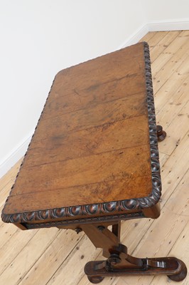 Lot 409 - A late Regency or George IV pollard oak centre table
