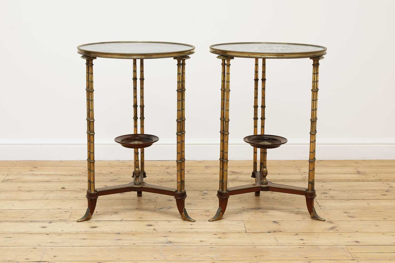 Lot 80 - A pair of French Louis XVI-style marble and bronze guéridons