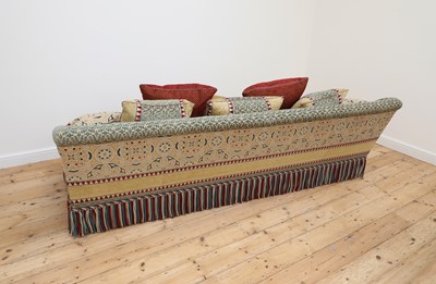 Lot 81 - A three-seater sofa