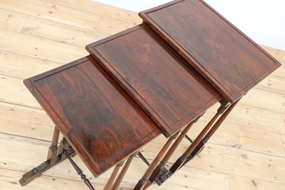 Lot 447 - A William IV rosewood nest of three tables