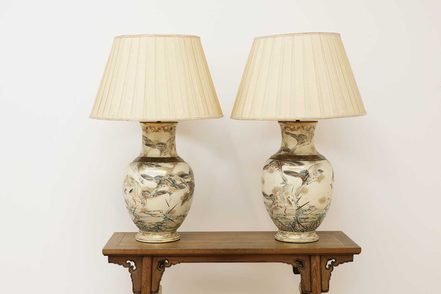 Lot 82 - A pair of large Satsuma vase table lamps