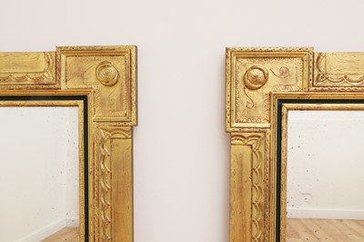 Lot 77 - A pair of giltwood and ebonised mirrors