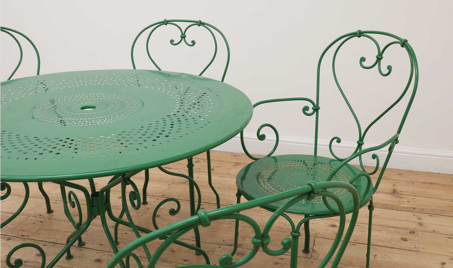 Lot 106 - A green-painted aluminium garden table