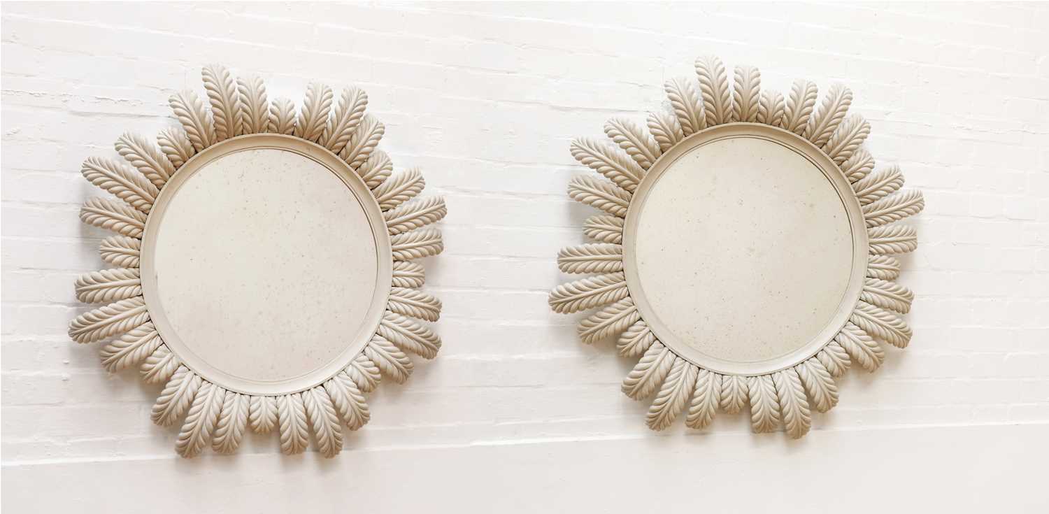 Lot 100 - A pair of modern circular mirrors