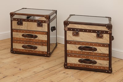 Lot 99 - A pair of polished metal and leather aviator trunks