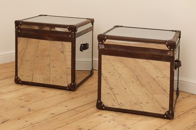 Lot 99 - A pair of polished metal and leather aviator trunks