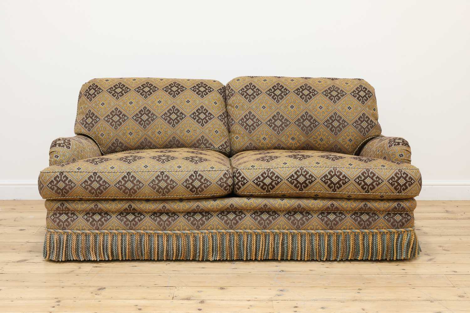 Lot 98 - A two-seater sofa