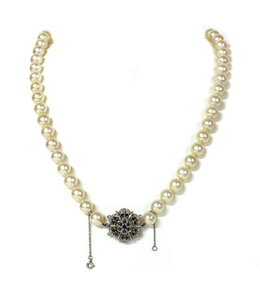 Lot 1260 - A single row uniform cultured pearl necklace