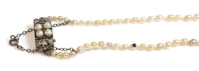 Lot 146 - A single row graduated natural saltwater pearl necklace