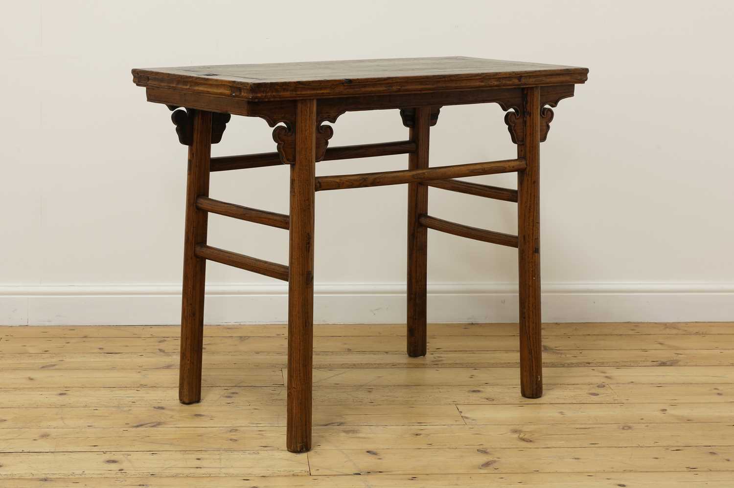 Lot 189 - A Chinese northern elm wine table