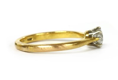 Lot 1089 - A gold single stone diamond ring