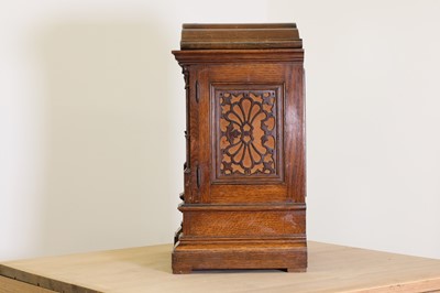 Lot 262 - A carved oak repeating bracket clock