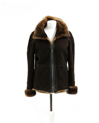 Lot 585 - An Armani brown Orylag furlined short jacket