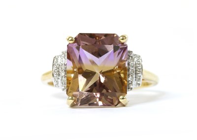 Lot 1386 - A 9ct gold ametrine and diamond ring