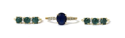Lot 1392 - A 9ct gold spinel and diamond ring